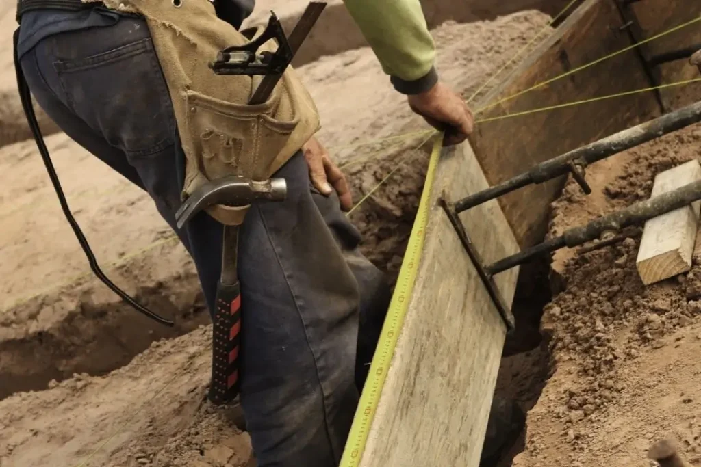 Worker adjusting the formwork